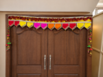 Handcrafted Traditional Multi-Colour Pennant Toran with Pearl Tassels & Side Latkans
