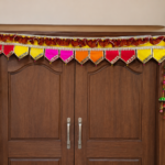 Handcrafted Traditional Multi-Colour Pennant Toran with Pearl Tassels & Side Latkans