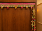 Handcrafted Traditional Pink-Gold Embroidered Toran with Fabric Bell Tassels & Scalloped U-Arch Panels - Image 3