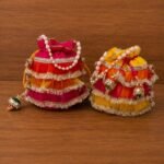 Designer Frill Potli Bag for Women – Dupion Silk Ethnic Party Bag with Moti Handle