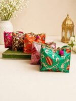 Traditional Floral Print Gift Bags with Golden Lace and Pom-Pom Charms