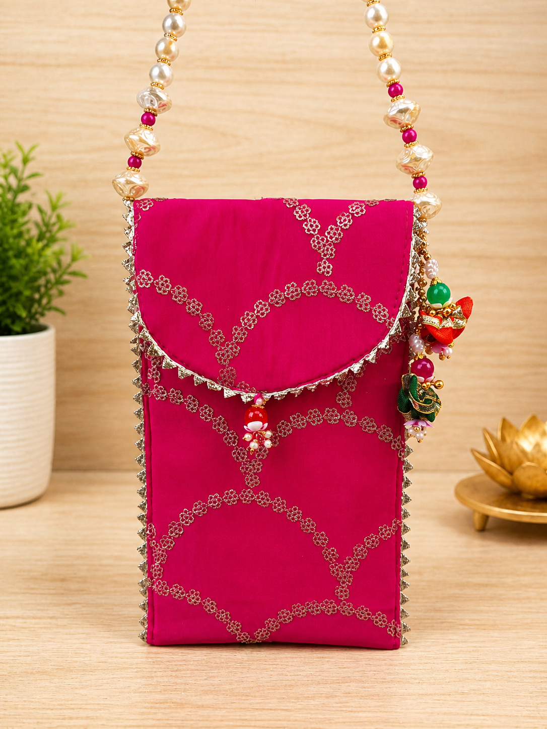 file_000000007c40720899f2ee0ec25ba6c7 Handcrafted Red Silk Mobile Cover with Pearl Beaded Strap & Silver Embroidery - Image 1
