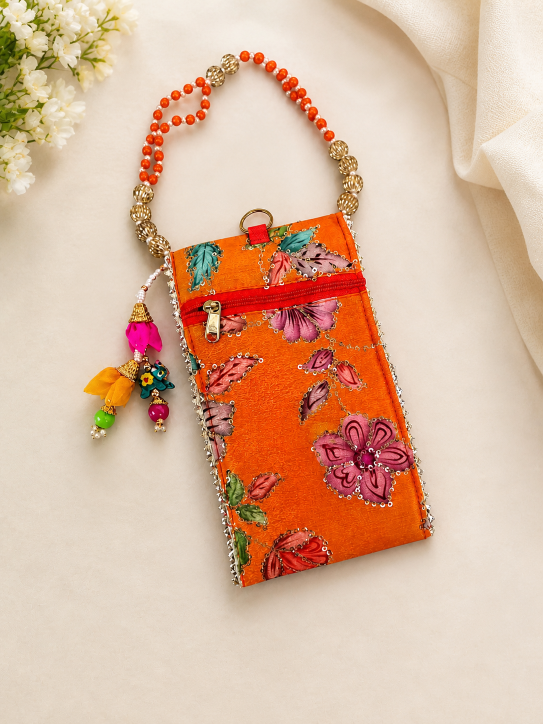 file_00000000f66c7207914b7a1e86d1b5ff Handcrafted Embroidered Silk Mobile Pouch with Beaded Strap - Image 1